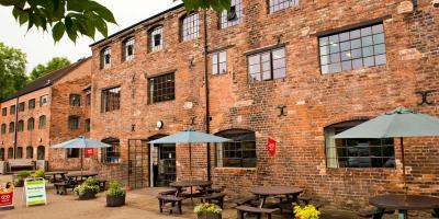 YHA Ironbridge Coalport hostel and outdoor seating YHA Ironbridge Coalport exterior