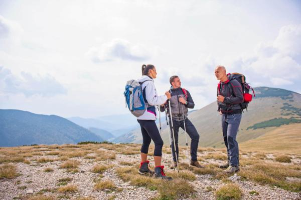 Mountain guide instructs a group of young people