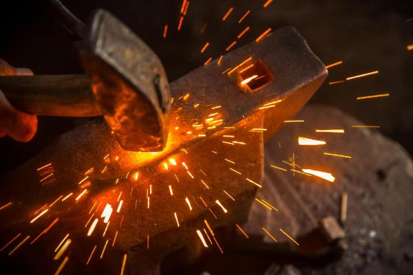 Finch Foundry, man working on anvil in forge