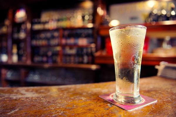 Cold Glass of Cider on a Pub Bar