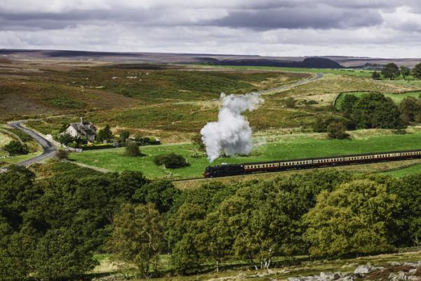 Steam train travelling through the North York Moors