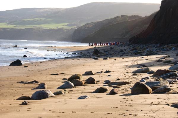 Robin Hood's Bay sandy beach with a low tide