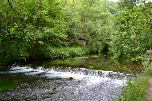 Waterfall and countryside in Hartington