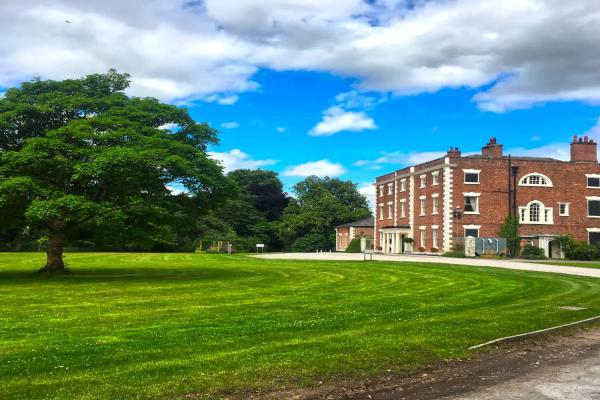 YHA Chester Trafford Hall exterior on a sunny day