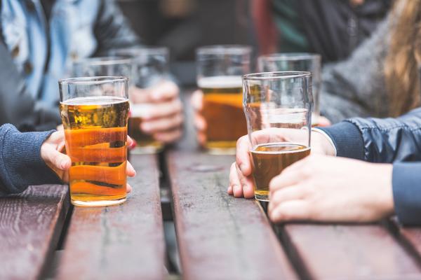 Group of people enjoying a beer