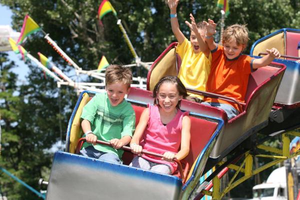 Children riding a Roller Coaster