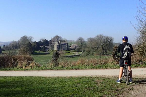 Cyclist overlooking Cholderton countryside