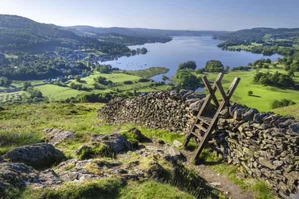 A morning shot of Lake Windermere showing the stone walling and the stile providing passage over the wall