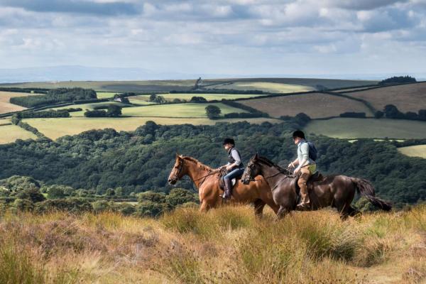 a couple of horse riders on the Devon moors