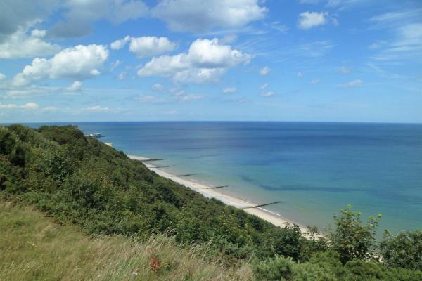 View of beach in Norfolk leading out to the sea