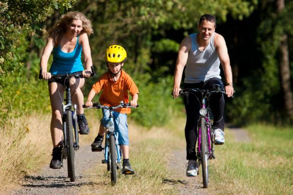 Family cycling on a summers day at YHA Okehampton