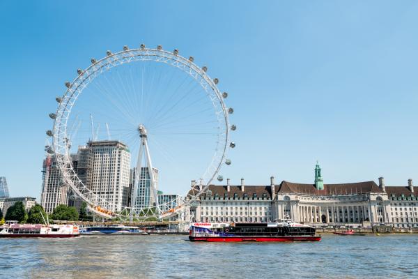 Thames river by London Eye, City Hall at Victoria Embankment in sunny summer 