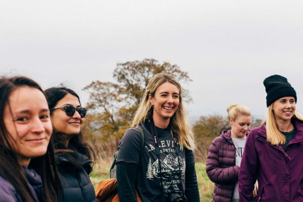 Group of women walking in the countryside