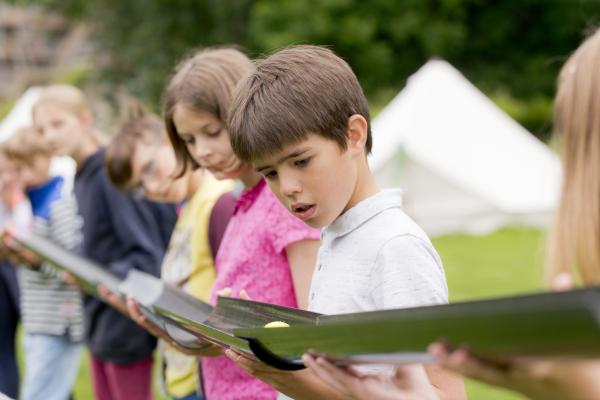 Children on a YHA School trip reading Alex Rider