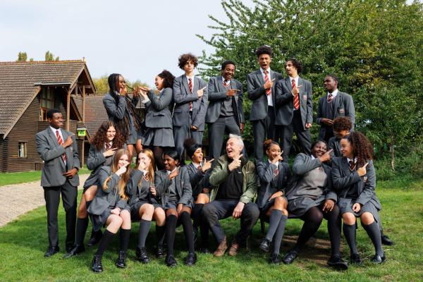 Larry Lamb with school group