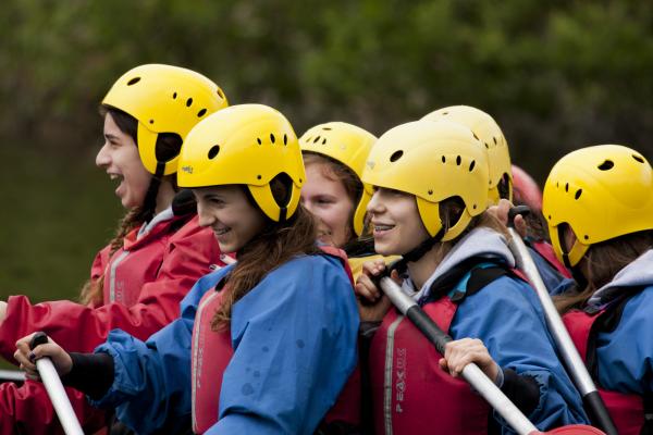 Group of young people on a raft