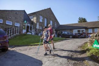 Walkers by YHA Hawes entrance