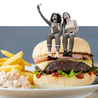 Women sat on top of a burger