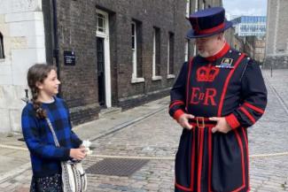 Child meeting a Beefeater