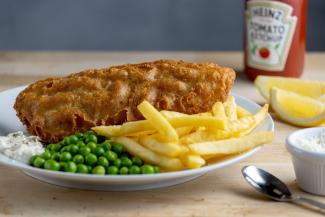 Battered fish, chips and peas