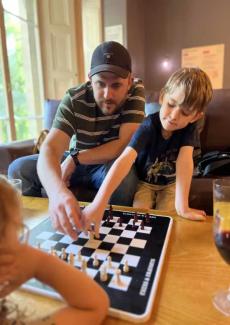 Family playing chess