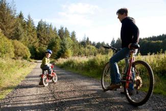 Father and son cycling in the Dartmoor National Park