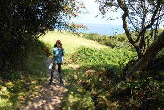 Girl stood in woods near Ravenscar