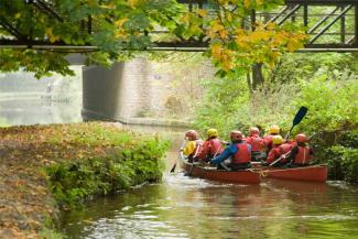 Group of children canoeing