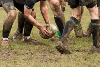 A group playing rugby