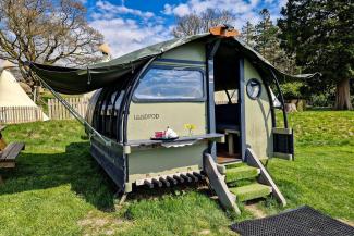 Glamping Landpod with open canvas roof