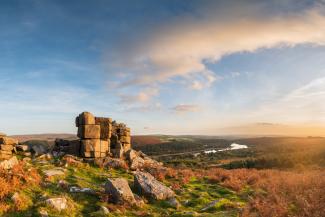 Stunning Autumn sunset landscape image of view from Leather Tor