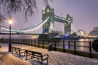 London bridge at night with snow on the ground