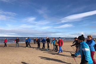 Nordic walking on beach