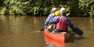 Family canoeing at YHA Okehampton