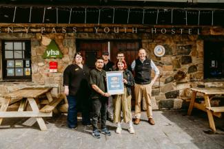 The YHA Snowdon Pen-y-Pass team with the Hoscar award