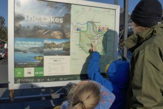 Family looking at a map