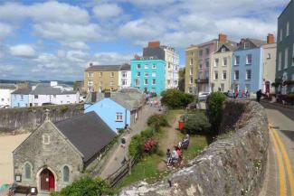 Colourful houses leading down a hill