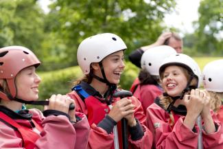 Younge people taking part in raft building at YHA Edale