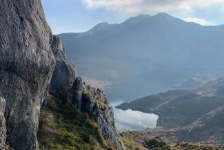 Wild landscape with a lake surrounded by mountains