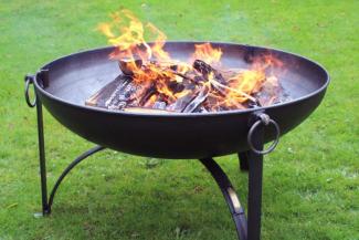 Firepit with lit wooden logs