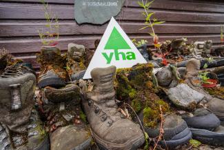 Mismatched walking boots left outside