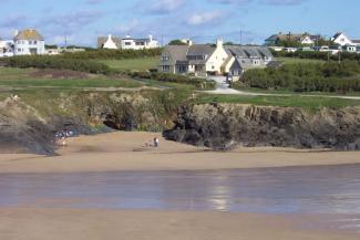 View of YHA Treyarnon Bay from across the beach