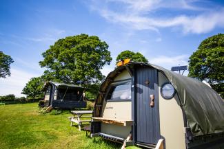 Landpods in camping field at YHA Windermere