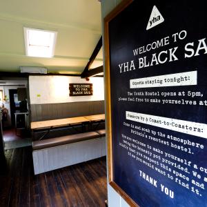 Welcome sign for YHA Black Sail