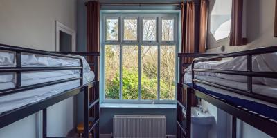 YHA Windermere bedroom with bunkbeds and view out the window