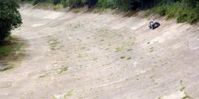 Classic car on Brooklands banked racetrack