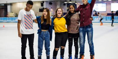 Teenagers ice skating