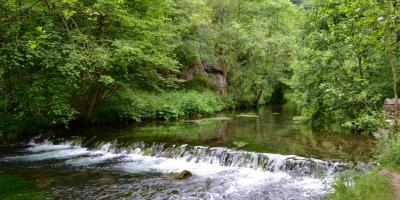 Waterfall and countryside in Hartington