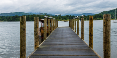 Wooden pier leading out onto a lake