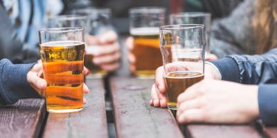 Group of people enjoying a beer